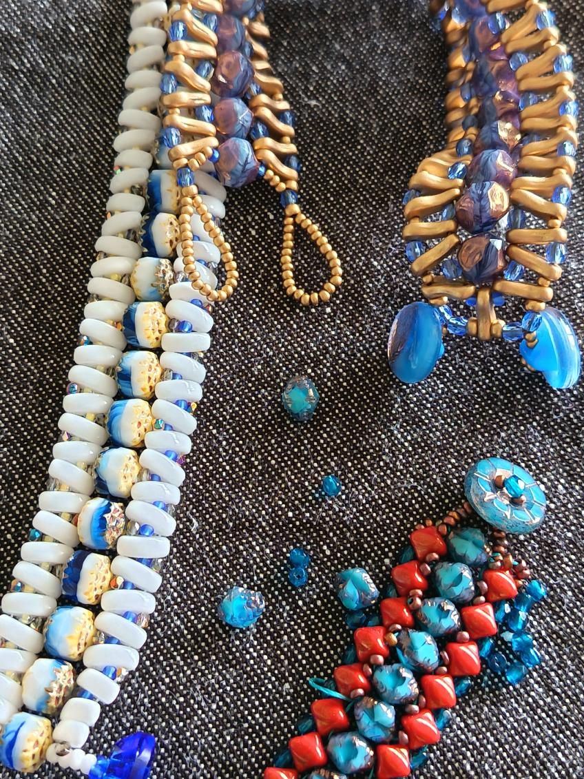 Beaded work laid out after an afternoon session