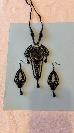 Traditional Czech black glass jewellery set by Stanislav Jiroš — necklace and matching earrings