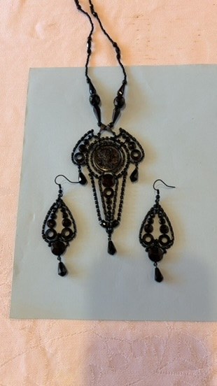 Traditional Czech black glass jewellery set by Stanislav Jiroš — necklace and matching earrings
