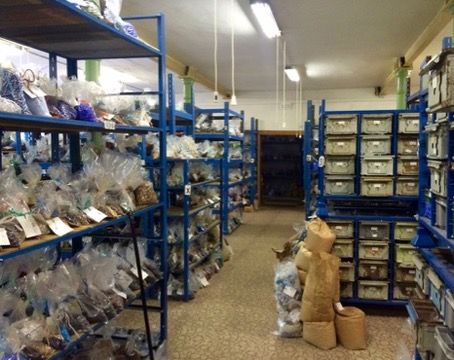Warehouse shelves stacked with bead boxes