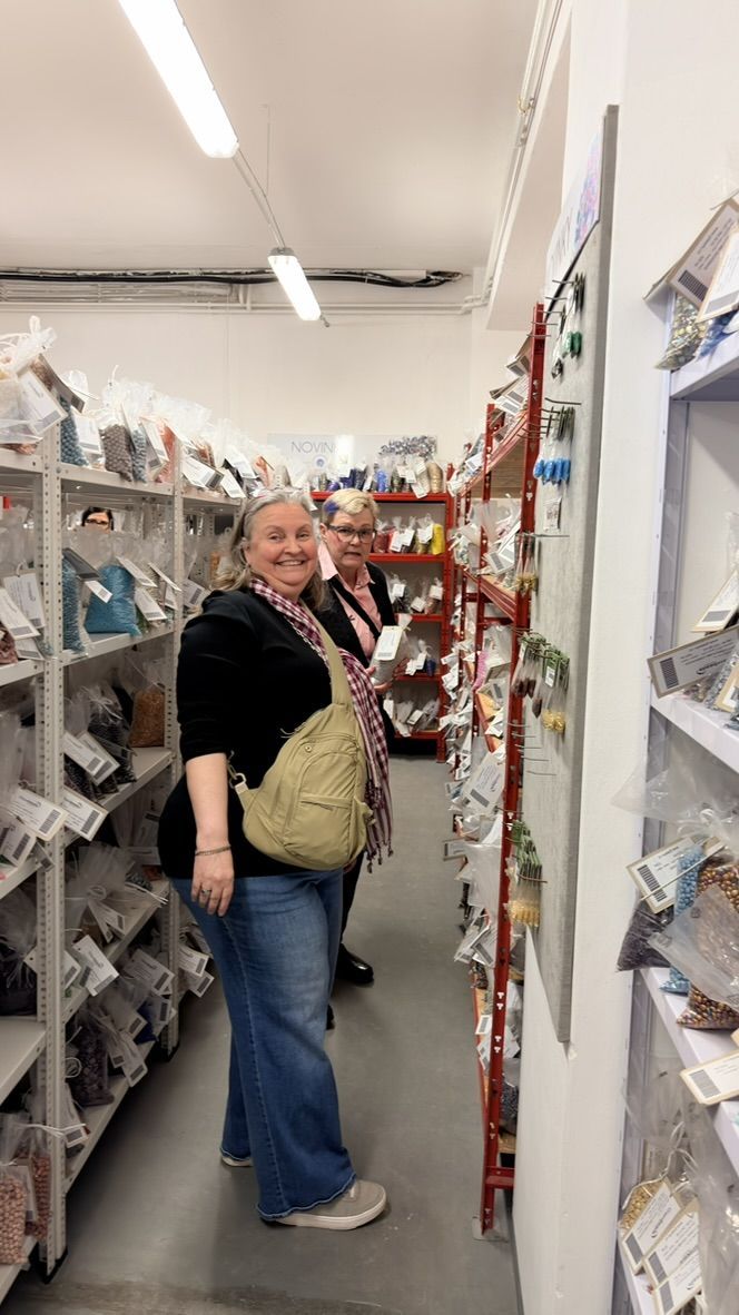 Happy shopper with grey hair and a full basket
