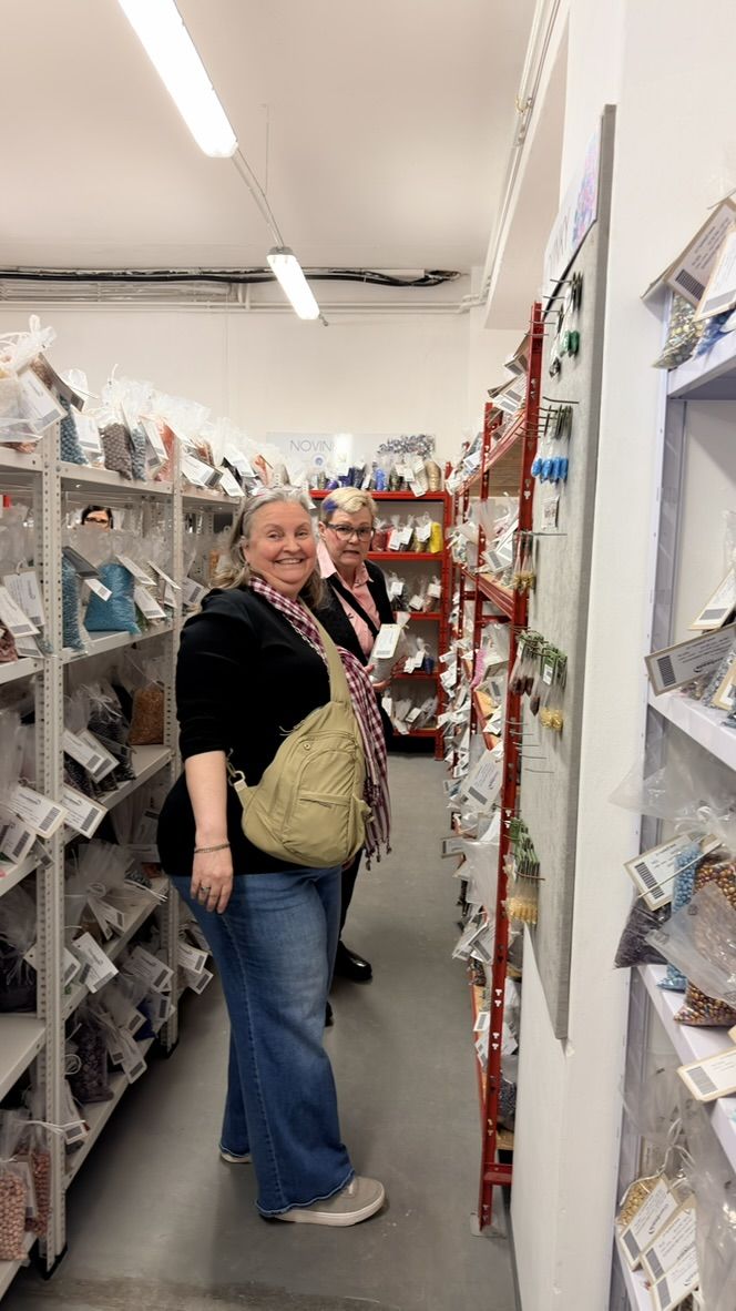 Happy shopper with grey hair and a full basket