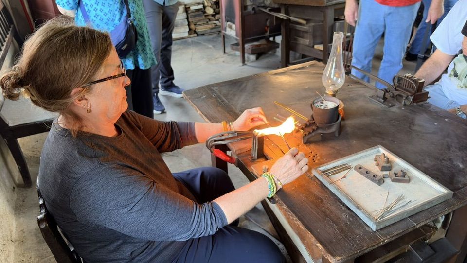 Workshop demonstration of bead-making the old way